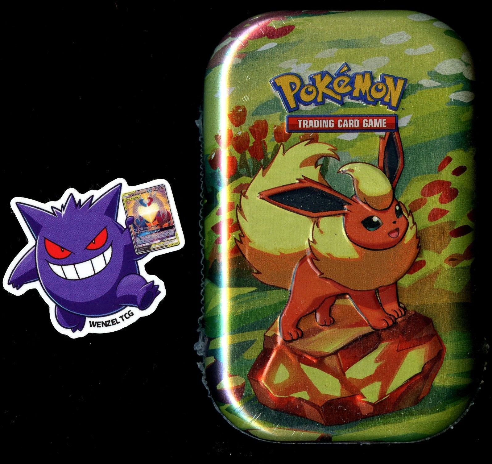 Prismatic Evolutions Mini Tin